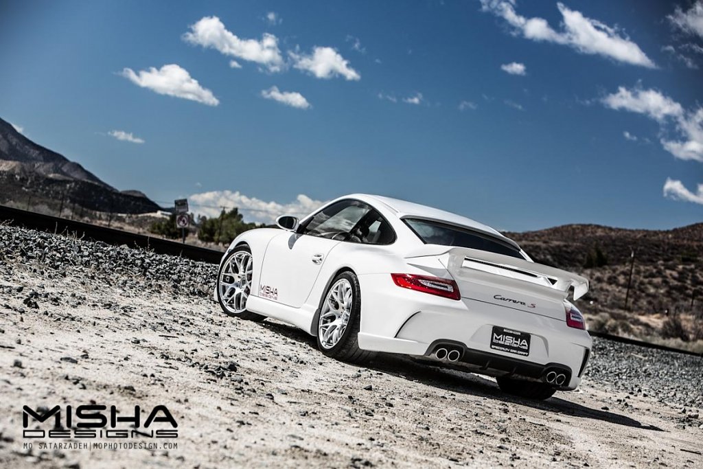 Click image for larger version

Name:	Porsche-997-Body-Kit-Misha-Designs-GTM2-white-911-Carrera-22.jpg
Views:	5025
Size:	327.4 KB
ID:	253053