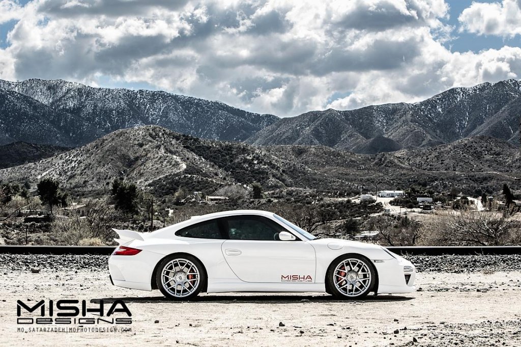 Click image for larger version

Name:	Porsche-997-Body-Kit-Misha-Designs-GTM2-white-911-Carrera-23.jpg
Views:	4863
Size:	466.2 KB
ID:	253054