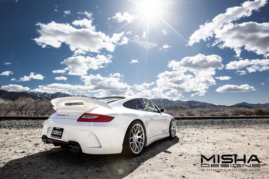 Click image for larger version

Name:	Porsche-997-Body-Kit-Misha-Designs-GTM2-white-911-Carrera-25.jpg
Views:	4928
Size:	355.8 KB
ID:	253056