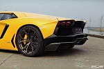 Click image for larger version

Name:	YellowAventadorRS047_zps9a40cb2c.jpg
Views:	690
Size:	62.0 KB
ID:	326820