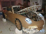 Click image for larger version

Name:	Porsche%20GT3%20cardboard%20hits%2010mph%20and%20only%20weighs%20219%20pounds%20-%2009.jpg
Views:	2731
Size:	46.2 KB
ID:	359093