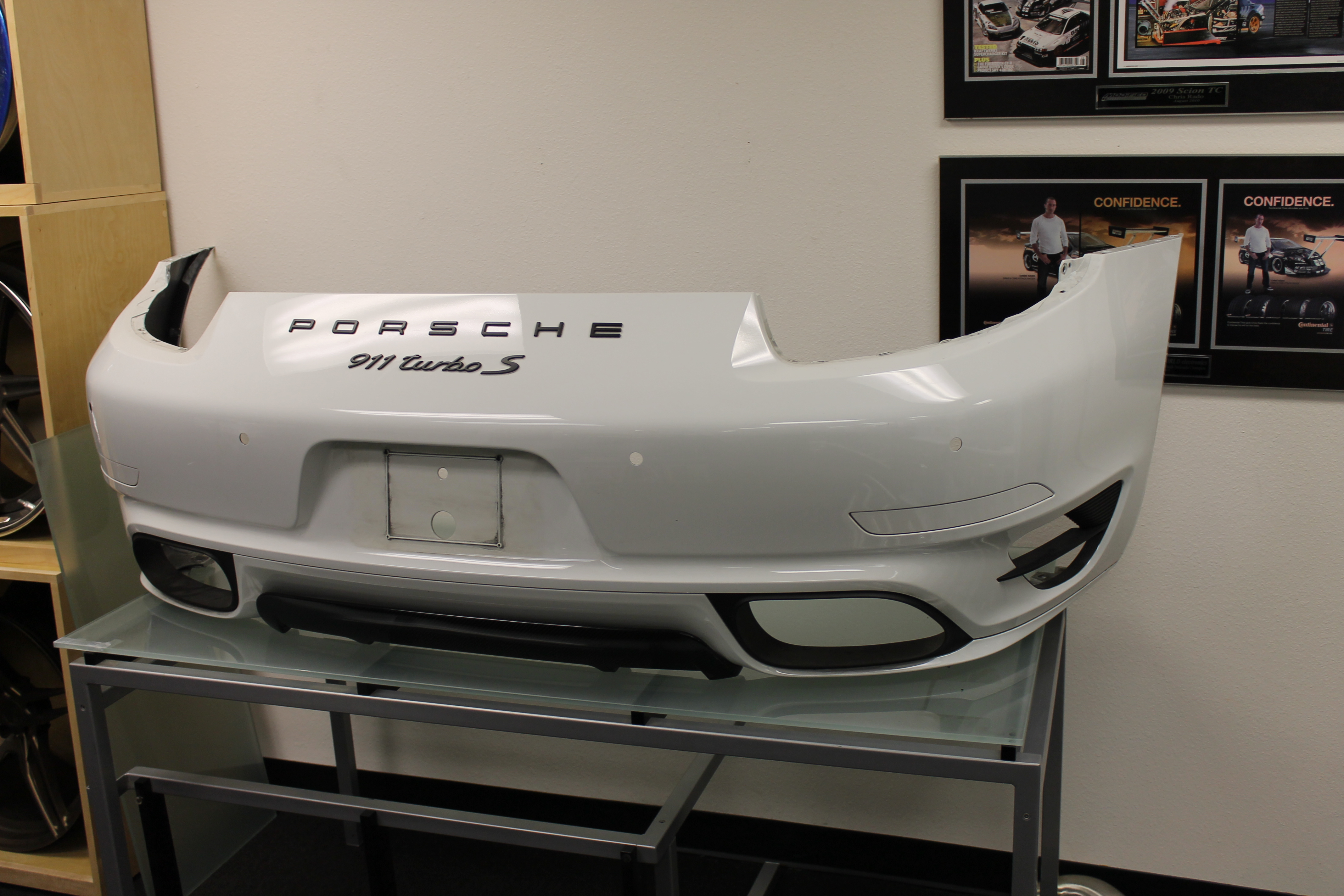 Name:  Porsche_991_turbo_s_rear_bumper_with_techart_carbon_fiber_diffuser_black_letters_matchi.jpg
Views: 257
Size:  3.18 MB