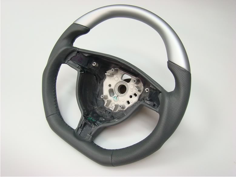 Name:  997sportsteerngwheelwithsilvertop_01.jpg
Views: 980
Size:  56.2 KB