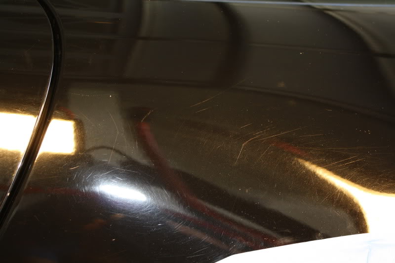 Name:  blackporshe125.jpg
Views: 293
Size:  62.7 KB