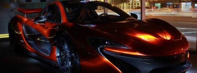 McLaren P1 poses with F1 Car in California