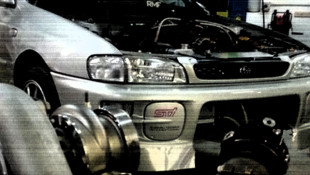 Two beards, one RSTi, massive front aero, and One Lap of America