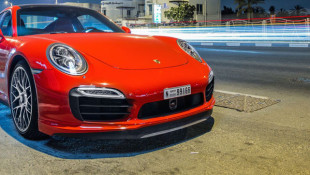 TRAFFIC REPORT Tesla Unveils AWD Model, Aston Martin Loses Big Bucks and More
