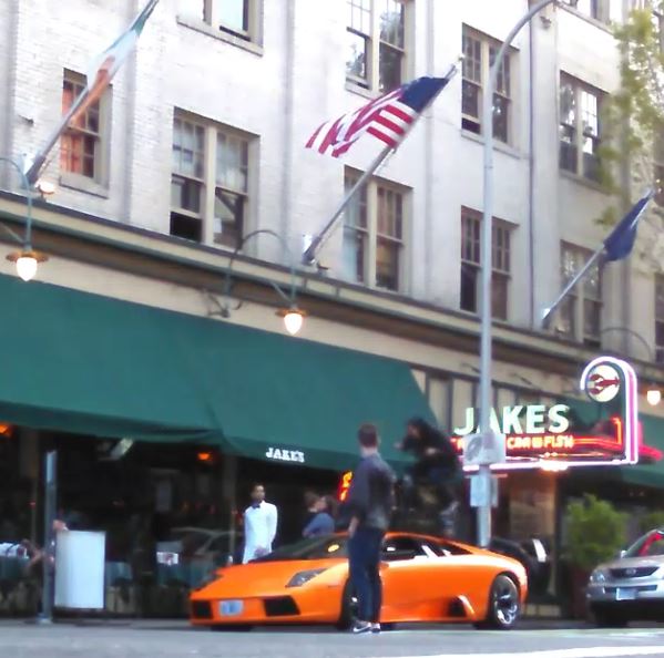 BMX Jerk Rides over Lamborghini