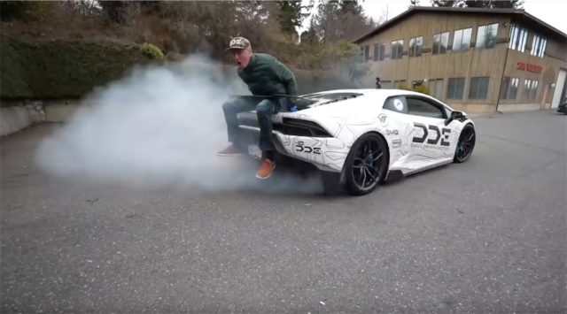 Riding a Lamborghini.