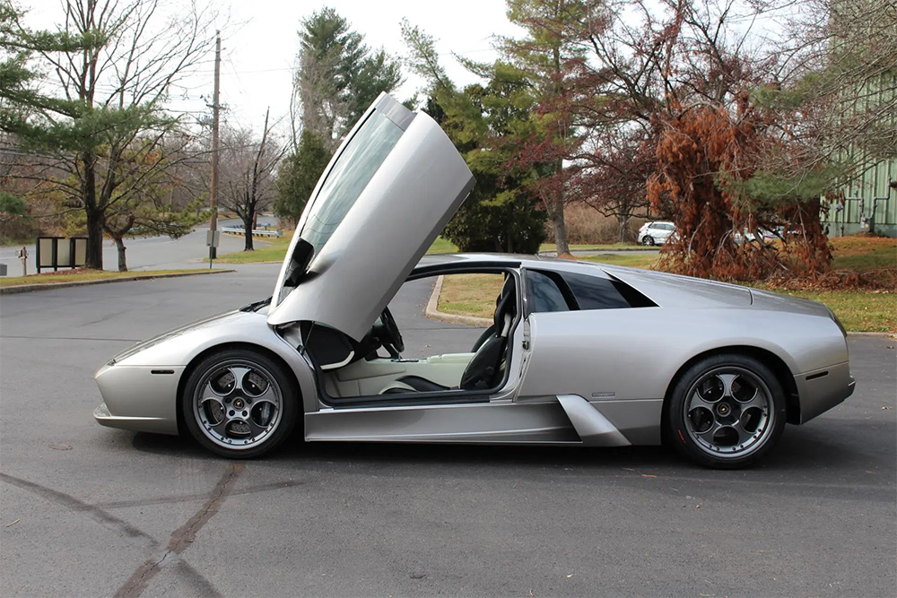 2004 Lamborghini Murcielago doors up gated six speed manual transmission bring A Trailer