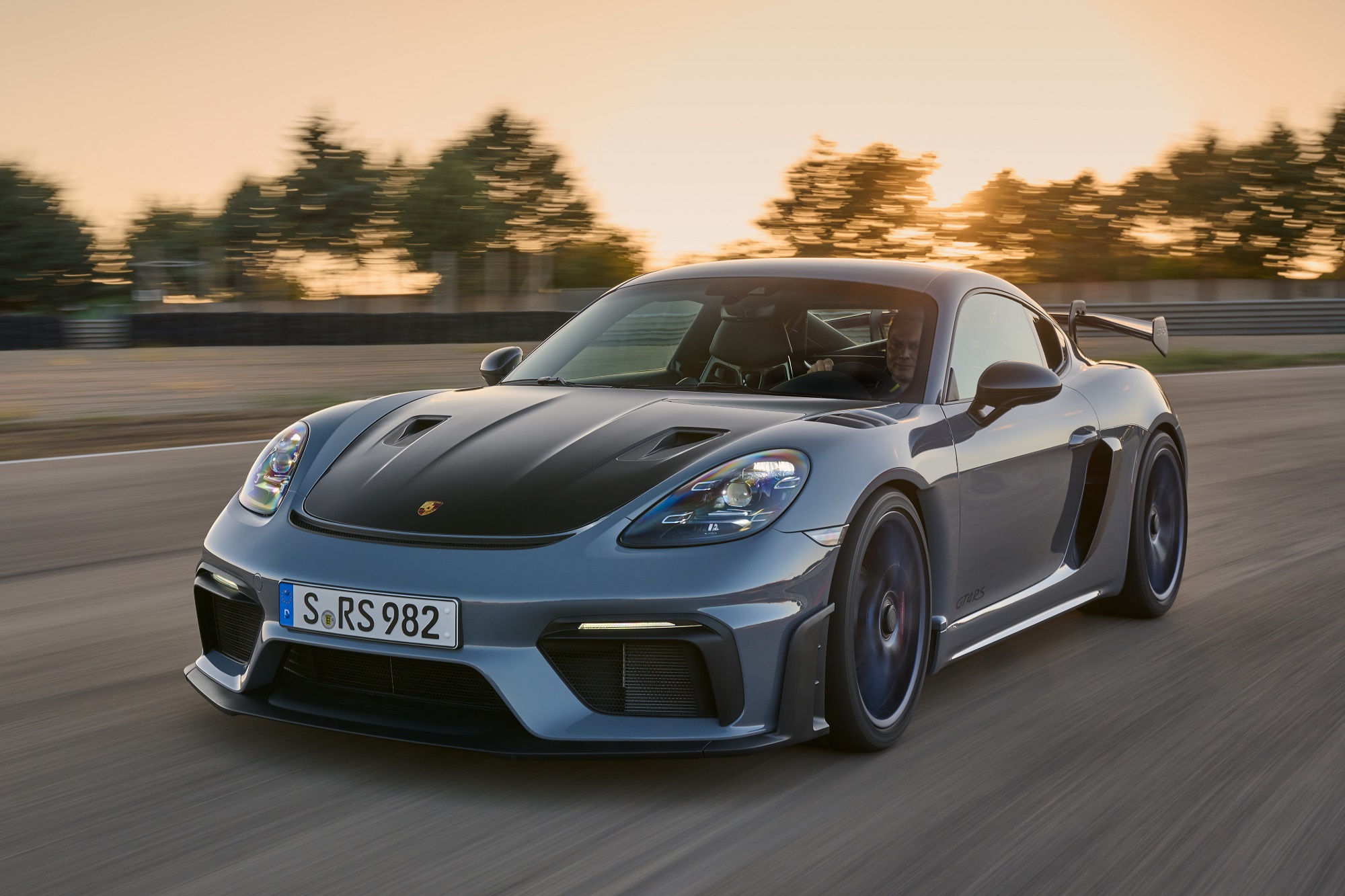 photo of Can the 2023 Porsche 718 Cayman GT4 RS Take on a 911 GT3? image