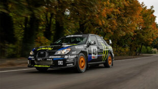 Ken Block Driven Subaru WRX group N Rally car Bring A Trailer front 3/4 on road rolling shot
