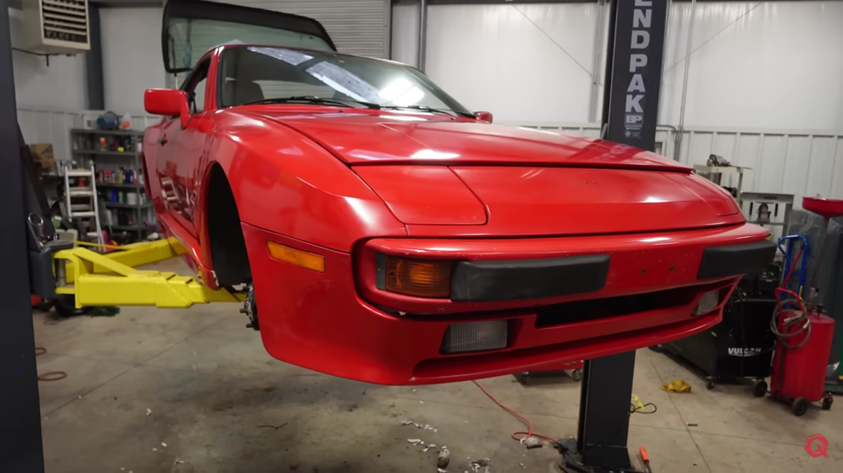 A red Porsche 944 and The Questionable Garage
