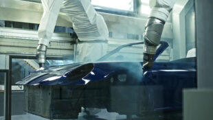 Porsche 911 getting painted by robots at Porsche factory