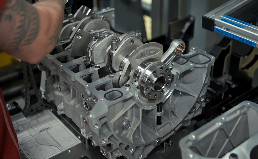 Porsche Factory Employee Assembing a 911 Flat Six Engine