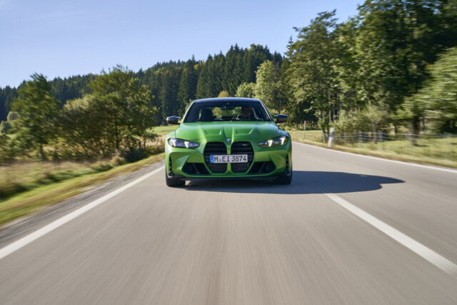2025 BMW M3 Competition European Spec Model front driving down road