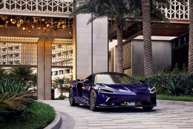 An OpenAI executive and her husband are suing McLaren over mansion party fines.