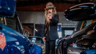Magus Walker Standing in His Porsche Collection Storage