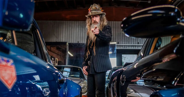 Magus Walker Standing in His Porsche Collection Storage